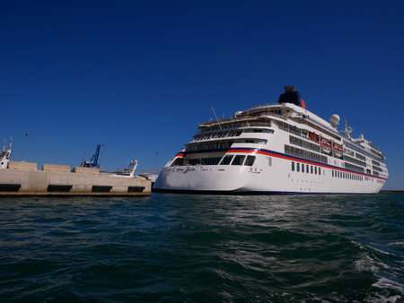 Beautiful photo of a white cruise ship on the Mediterranean Seaの写真素材