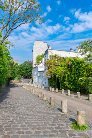 Paris, typical cobblestone street of Montmartreの写真素材