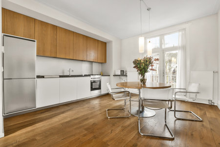 A modern room with furniture and the bright light coming from the window