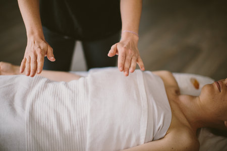 A masseuse massaging a womanの写真素材
