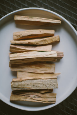 A top view of a plate of wood pieces on a white plateの写真素材