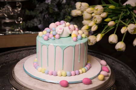 An Easter cake decorated with colorful eggs