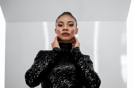 A closeup shot of a Black young female model from Grenada adult posing for a photoの写真素材