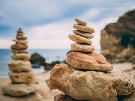 A pile of rocks stacked on top of each other in Olhos de Agua beach in Algarve, Portugal