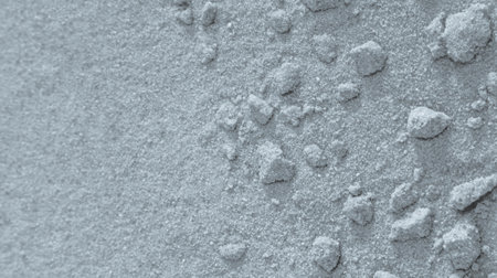 A gray sand texture with lumps