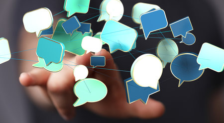 A 3D rendering of colorful speech bubbles with a real person in the background