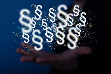 A 3D rendering of section signs network over a real person's hand - online law services conceptの写真素材