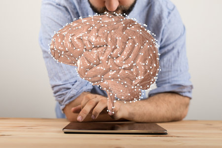 A digital concept of artificial intelligence with an illustration of a human brainの写真素材