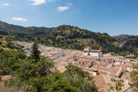The white mountain village at the foothills of Sierra de Grazalema, Andalusia, Spain.の写真素材