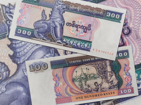 A close-up shot of two Myanmar Hundred Kyat banknotes