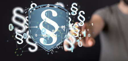 A person's hand touching 3D rendered section signs