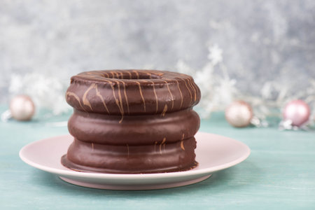 Traditional german christmas chocolate cake called Baumkuchen, winter season sweets, empty copy spaceの写真素材