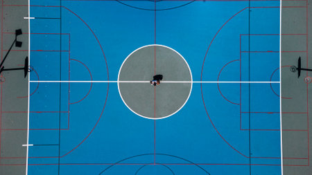 An aerial view of the central part of the  blue basketball playgroundの写真素材