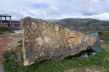 The poetry of Rainer Maria Rilke rock carved in a stone on the road to Ronda, Spainの写真素材