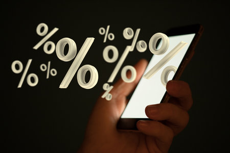 A digital concept of discount and commission, 3d percent signs floating out of screenの写真素材