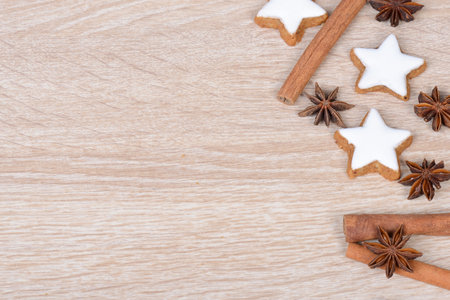 Cinnamon stars, traditional german christmas cookies, gingerbread, empty copy space, wooden background, greeting cardの写真素材