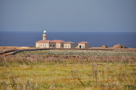 Punta Nati lighthouse on  Spanish balearic island Menorca, Spainの写真素材