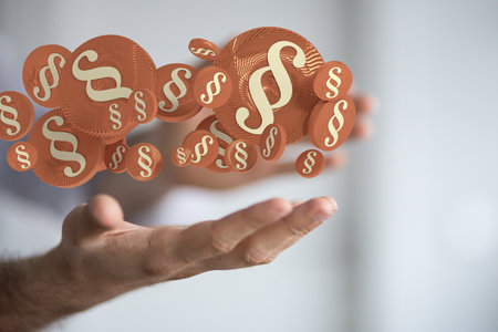 A 3D rendering of section signs hovering over a man's palm - law and justice concept
