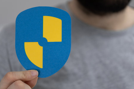 A person presenting cybersecurity and information or network protection symbol