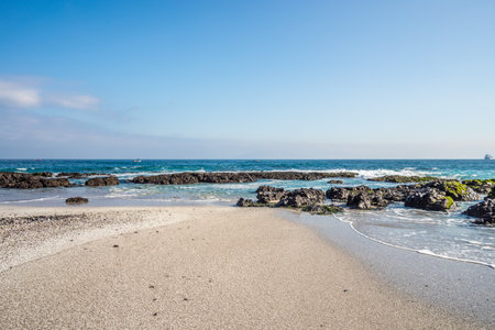 A beautiful shot of a calm sea under the blue skyの写真素材