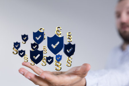 Floating 3D law and justice security icons above a handの写真素材