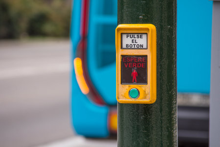 A pedestrian traffic stop button along the road in Malaga, Spainの写真素材