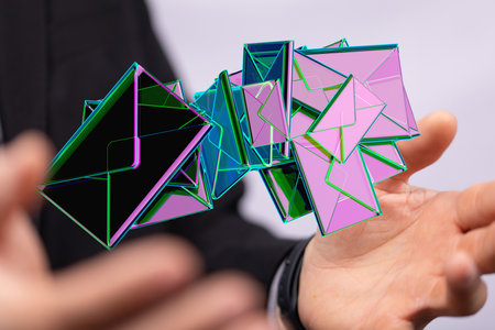 Hands holding message icons - the concept of online communication