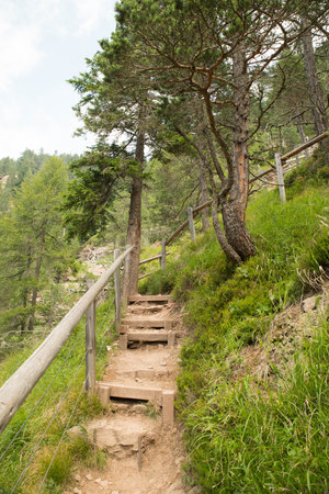 Bletterbach Gorge in the Dolomites in Italy, hiking in the valley and the mountains, Butterloch waterfall, landscapeの写真素材