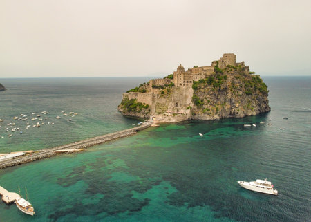 The medieval Aragonese Castle of Ischia in Italyの写真素材