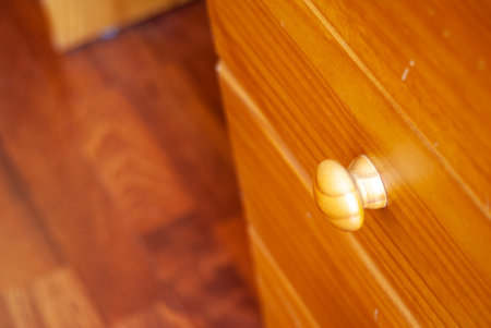 A closeup shot of the shelves of a wooden closetの写真素材