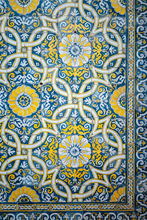 The azulejo tiles, traditional Portuguese mosaic in yellow and blue colorsの写真素材