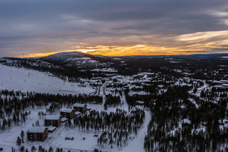 Aerial drone view of the Levi ski village, winter evening, in Laplandの写真素材