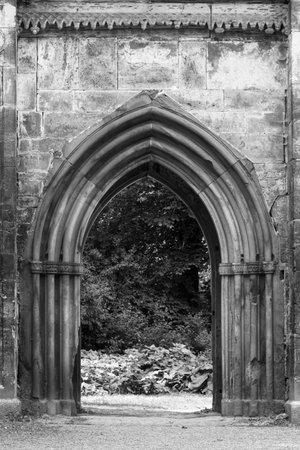 The neo-Gothic gate of the ruins of the Tempelherrenhaus  in black and white.の写真素材