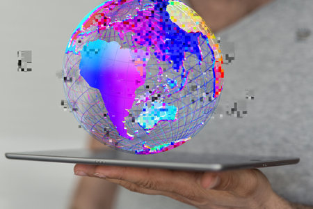 A person presenting a 3D render of the globeの写真素材