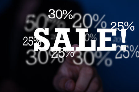 A male's hand pointing to an illustration of the Discount and commission conceptの写真素材