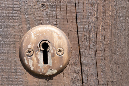 A closeup shot of a metal lock doorの写真素材