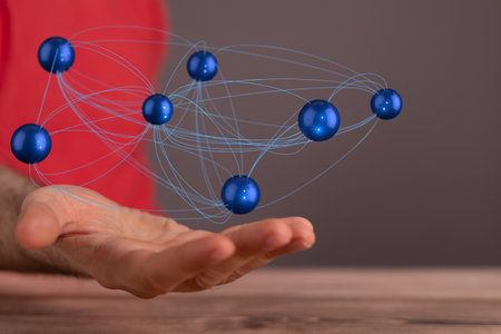 A 3D rendering of futuristic lines hovering over a man's handsの写真素材