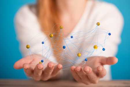 A social networking illustration in a hand of a man as a concept of team connectionの写真素材