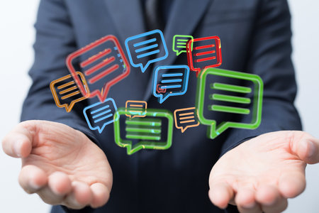 A digital concept of online people network, using the internet for communication, email icon floating on the handの写真素材