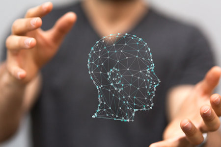 A human head in hands as a mind, brain, power, and energy conceptの写真素材