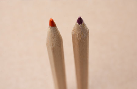 A closeup of two coloring pencils on a light backgroundの写真素材