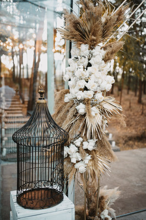 A vertical shot of the classy and elegant decorations of an outdoors wedding receptionの写真素材