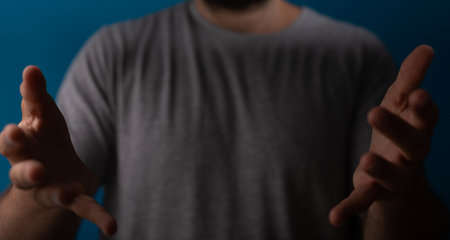 A blurred shot of male hands  with a copy space