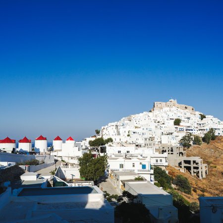 The historic medieval castle of the Astypalaia town against a clear blue sky in Santoriniの写真素材