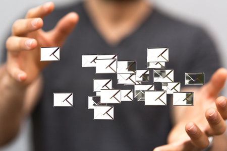 A person presenting the virtual projection of email inbox iconsの写真素材