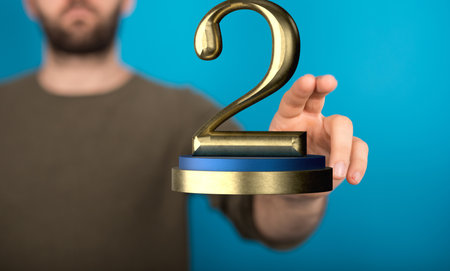 the male hands with 3d rendered winner second place ceremony awardの写真素材