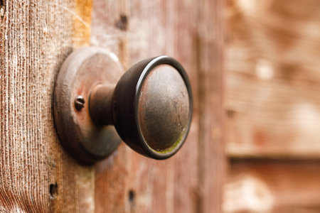 A closeup shot of a door handle during the daytimeの写真素材
