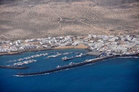Aerial or drone view over village on coast of Lanzarote