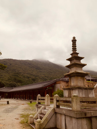A vertical shot of Haeinsa Temple in Hapcheon County, South Korea, on a cloudy dayの写真素材