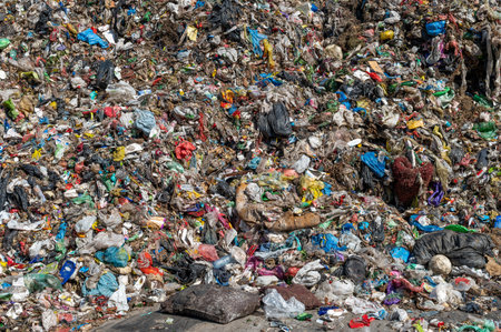 The waste treatment facility with piles of municipal wasteの写真素材